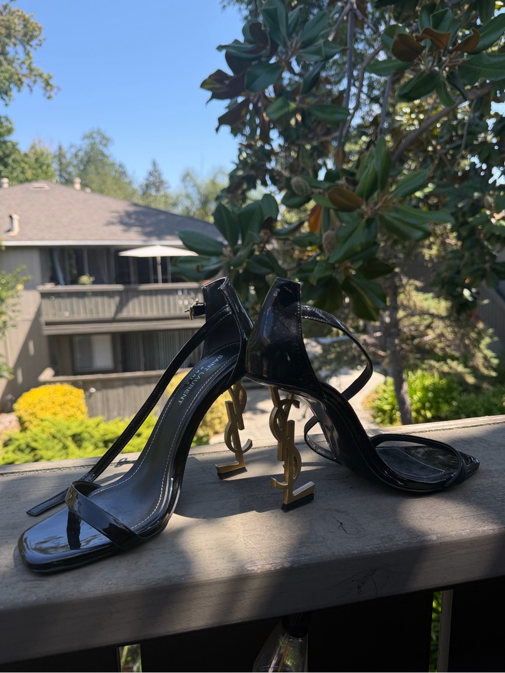 Yves Saint Laurent Black Patent Leather YSL Logo Heels with Gold Sculpted Heel
